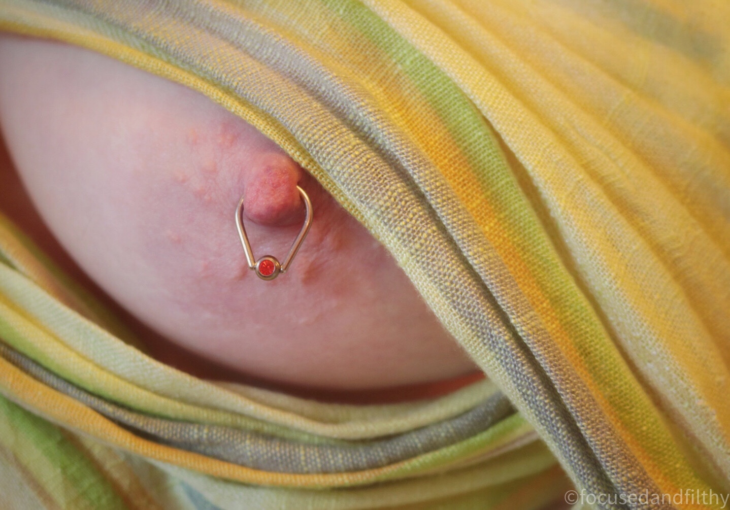 Teardrop nipple ring with an orange sparkly ball #SJC 152