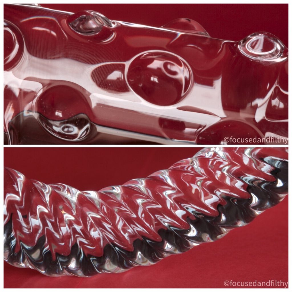 Collage of two photographs  one on top of the other  both are close up photographs of textured glass sex toys  the top one has some button like bumps on the surface and the lower image is a curved thin glass toy with like river ripples on it  the background to the images is red 