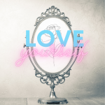 Love yourself logo with words in front of a large ornate mirror 