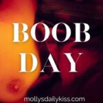 Boobday logo with the words over a warm image of a naked breast 