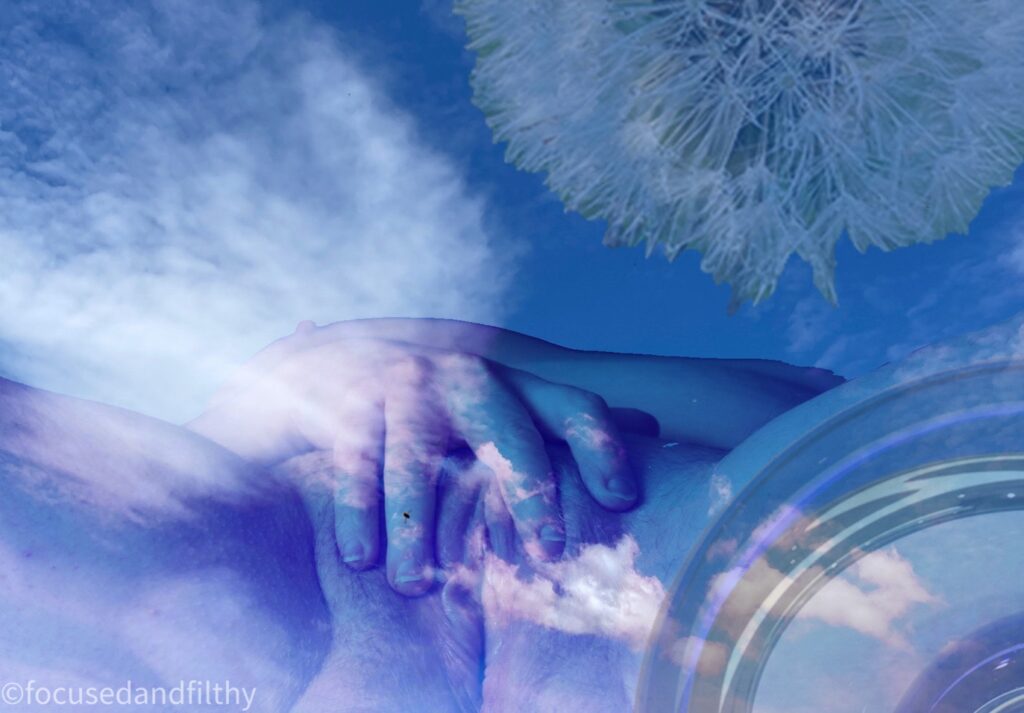An image made from several layers. The overriding image is a blue sky with fluffy white clouds but layered and blurred into this is an image of cunt, a dandelion head and a glass bowl.  It has a calm and floaty feeling 